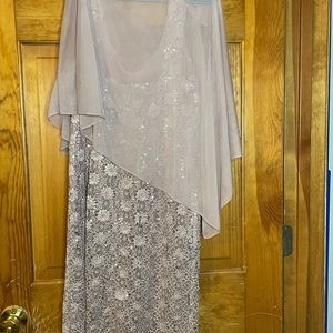 Beautifully sequined dress with sheer overlay